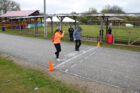 Wiiky 10k Frank Fisher Odjig 82 and daughter Lisa cross the finish line