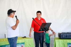 Emcee Roger Daybutch shares a chuckle with Wikwemikong Chief Duke Peltier.