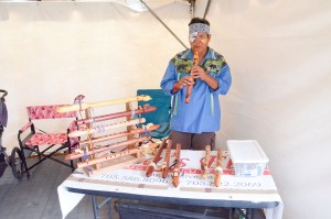 Flutist artisan Tony Wemigwans plays one of his creations tuned to 440 mhz. The flute is ready to play with other instruments. photos by Michael Erskine