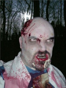 Director Jayson Stewart, seen here as a zombie, will begin shooting his zombie horror flick next month.