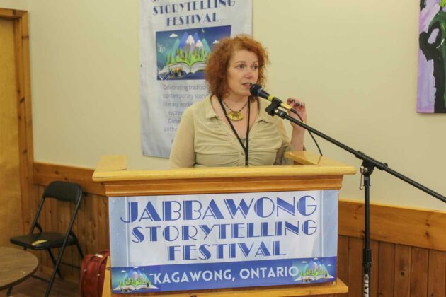 Kim Fahner, the fourth poet laureate of the City of Greater Sudbury and the first woman to be appointed to the role reads from her book of poems Emptying the Ocean at Jabbawong Storytelling Festival. photo by Tom Sasvari