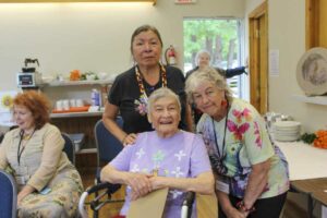 Writer, artist, dancer, educator, orator Karen Pheasant, left, Sharon Alkenbrack, one of the organizers of the event, and Ms. Pheasant’s mother Rosmary Pheasant, pose for a photo. photo by Tom Sasvari