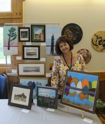 Kimily Mayer had her beautiful art work on display at Art in the Park.