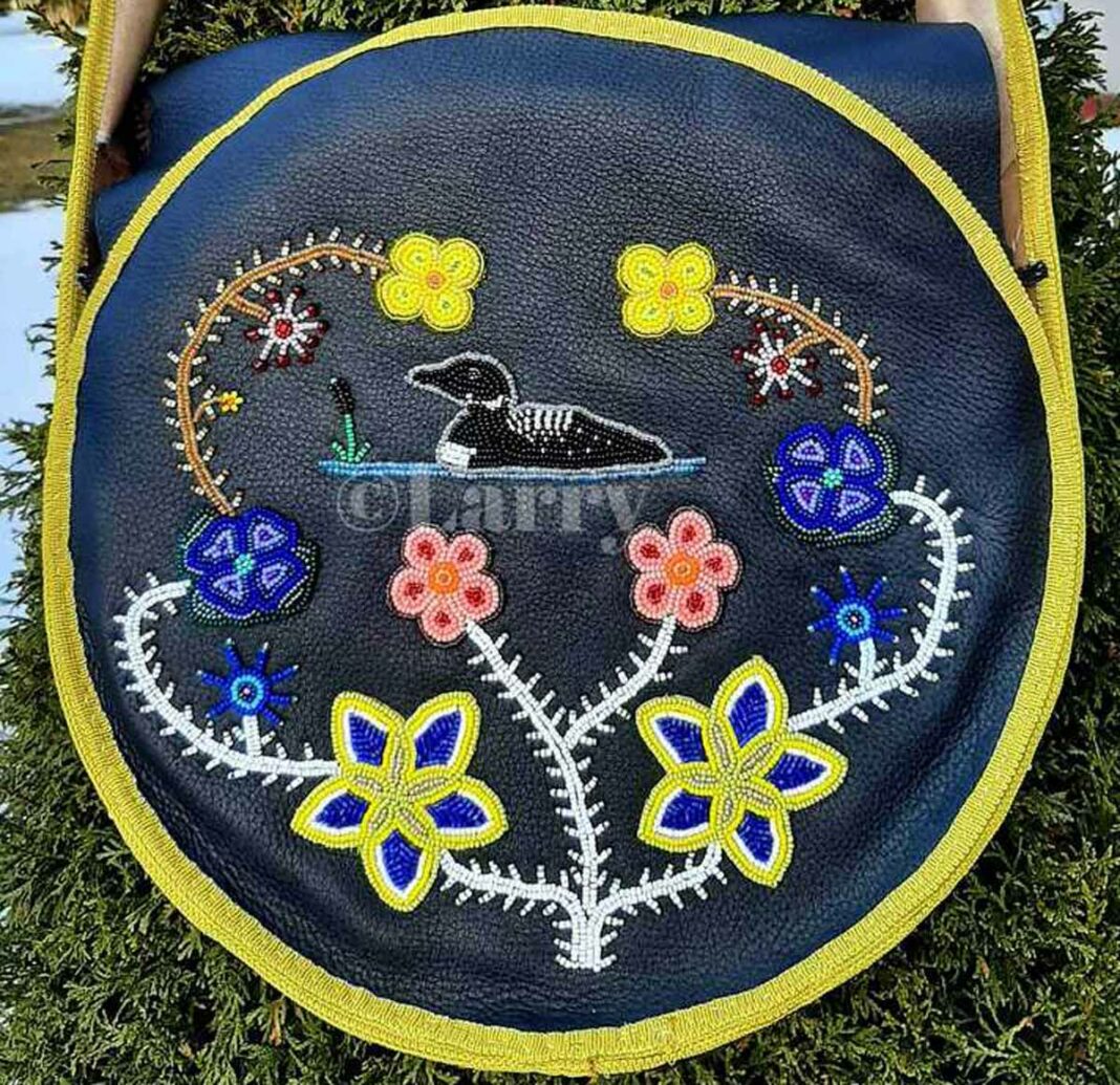 Intricate beadwork with Anishinabe motifs adorn this pouch. photo courtesy of Larry O’Connor