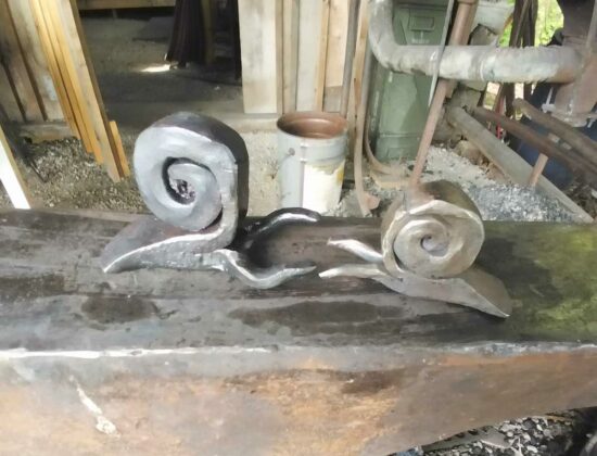 A large snail created by blacksmith Scott Hartley of Happy Camper Forge, located in Meldrum Bay.