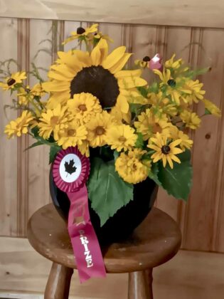 The first-place prize winning entry of Maimie Sim in the annual Assiginack Horticultural Society flower show.