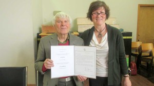 Billings councillor Barbara Erskine, right, presents a letter of congratulations from the Lieutenant Governor of Ontario, Elizabeth Dowdeswell, to Billings Mayor Austin Hunt. A 90th birthday party celebration was held for Mayor Hunt this past Sunday at the Park Centre in Kagawong.  