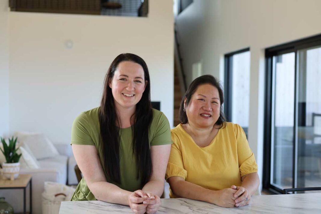 Brianna Marybelle and Christine McNaughton, two busy social media ladies, have planned the next High Tea event, yet take time off for this photo taken at Ten Mile Point Accommodations, in the Blue Heron House in Sheguiandah.