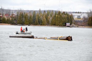 Members of the Coldwater crew assess the wreckage after high winds destroyed Coldwater property on Christmas Eve day.