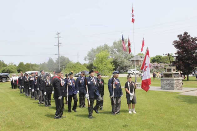 Members of the Royal Canadian Legion and Anavets parade into the Manitoulin District Cenotaph led by the Sergeant Charles A Golden Silver Star Rifle Team and a colour guard. photos by Tom Sasvari.