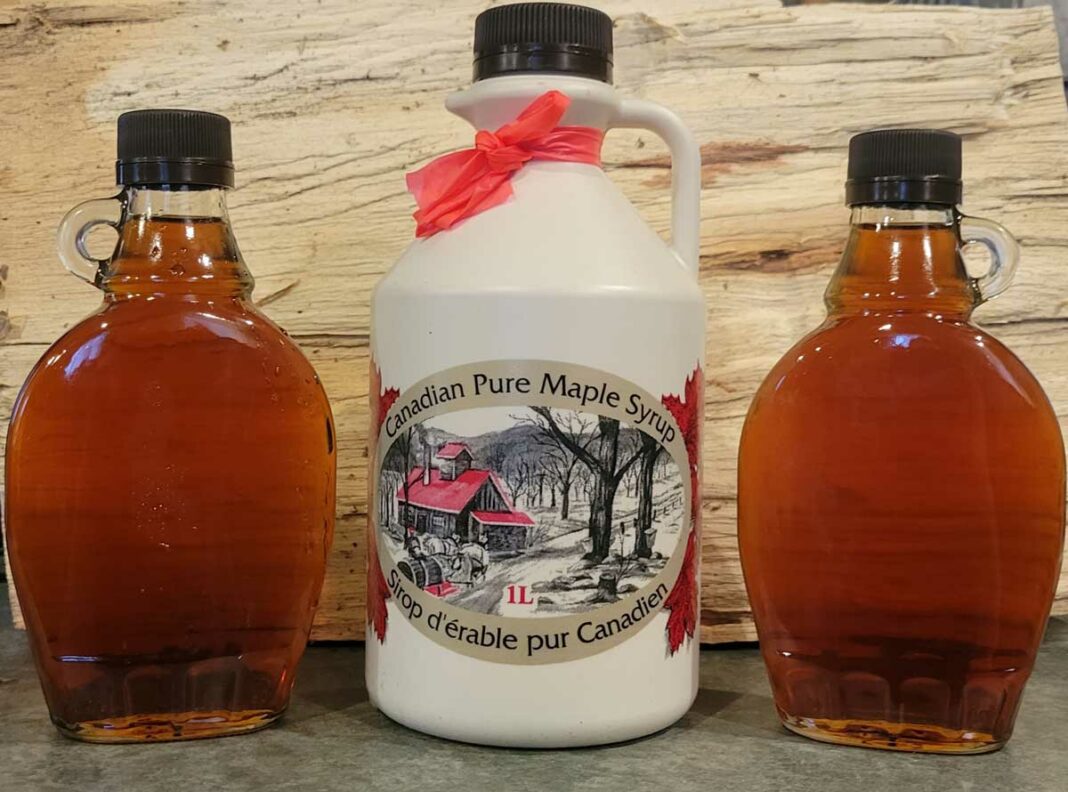 Three bottles of maple syrup