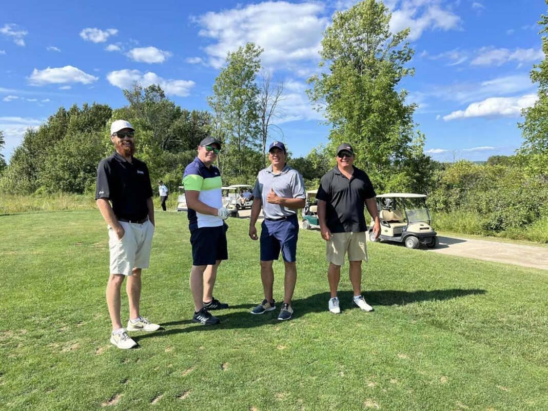 One of the men’s division teams at the Kina Gbezhgomi Child and Family Services (KGCFS) first annual Chip In Fore Kids charity golf tournament.