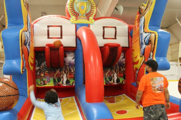 Making the winning shot! The basketball toss was one of the many games held as part of the Fun Days weekend.