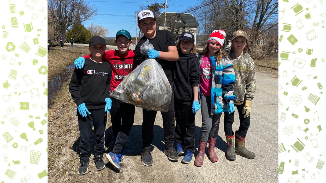 Assiginack Public School students pose with a haul of garbage they collected during last year’s event.