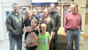 Jack Clark, far right in photo, congratulates the first place ‘Lockerson’ team at the Gore Bay New Year’s Family Fun night. 