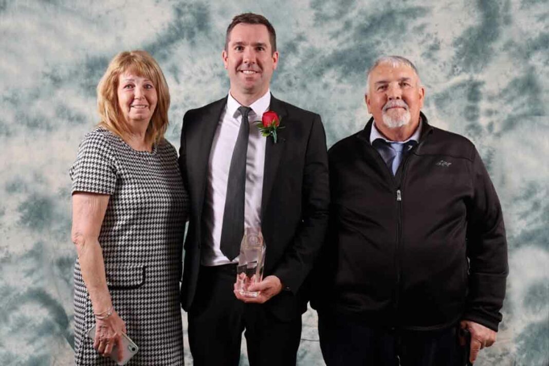 Golfer Ryan Willoughby, (centre) with his parents, Colleen and Lloyd Willoughby, is shown after his induction into the Ontario Colleges Athletic Association Hall of Fame on May 1.