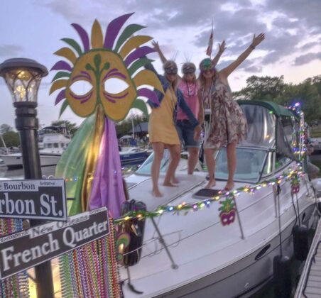 It’s Mardi Gras time! Ginger and Ken Wood and friends had their boat along with themselves all dressed to the nines for the Harbour Days Friday Night Boat Light It Up Contest.