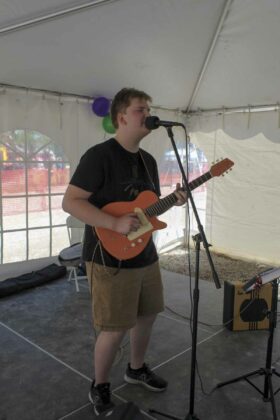 Singer Ethan Hunt of Kagawong entertains the audience at the Harbour Days celebration.