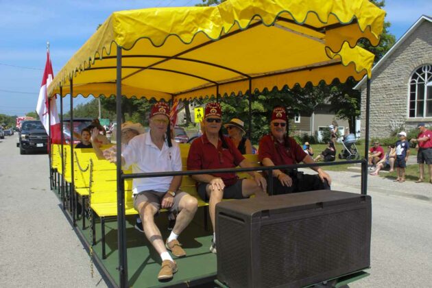 The Haweater Unit of the Shriners take part in the parade.