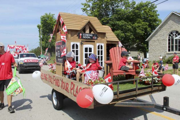 There were lots of kids participating in the parade, including these youngsters on the Royal Lepage float.