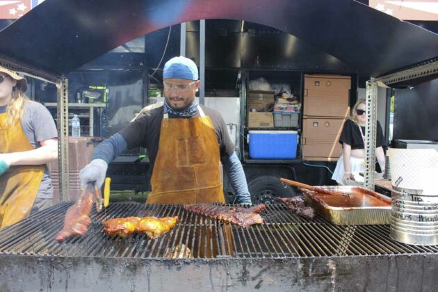 Award winning ribbers! Professional ribber Ed Vte of Made in America Smoke-house BBQ tends to the ribs and chicken at their booth at Homecoming weekend. Made in America was judged by a local panel of judges to have the best ribs, best chicken and the best pulled pork and were named best overall professional ribbers at Ribfest. Speaking of barbecuing, Brian Lund was the winner of the draw. For $3,350 Central Manitoulin Lions backyard barbecue ultimate dream package sponsored by Jake’s Home Centre.