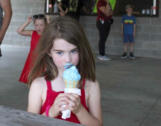 Gwendolyn Hodgins thoroughly enjoyed her ice cream at the Homecoming celebrations.