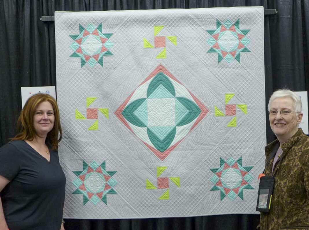 Silver Water quilter Lauren MacDonald, right, had the quilt she designed accepted into the National Juried Shown at Quilt Canada this year. Melissa McIntosh, left, quilted ‘Wheelhouse Modern,’ with amazing creativity.