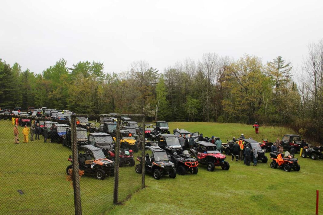 Participants are shown getting prepared for the start of the eighth annual Meldrum Bay ATV Ride.