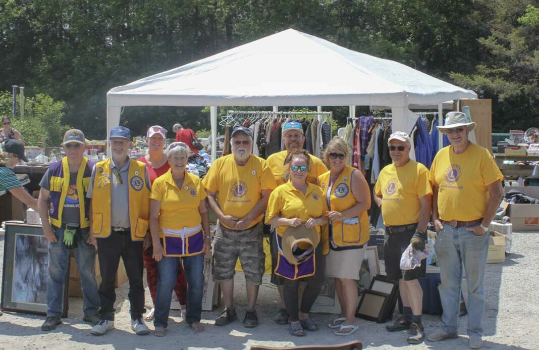 The Providence Bay and Spring Bay Lions Club is holding a fundraising golf tournament for the Manitoulin Secondary School robotics team, on September 16. In photo are the members of the Lions Club at their annual July 1 yard sale. The golf tournament will take place at the Brookwood Brae Golf Course.