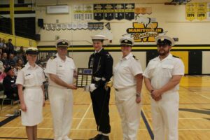 The End of Career Award Plaque and gifts were presented to Chief Petty Officer Second Class Rhys Allison. In photo, from left, is Acting Sub-Lieutenant Miranda Mackay, Lieutenant Sylvain Boucher, Cadet Rhys Allison, Sub-Lieutenant Tina Davidson and Civilian Instructor Daniel Bussieres. photo by Michael Erskine.