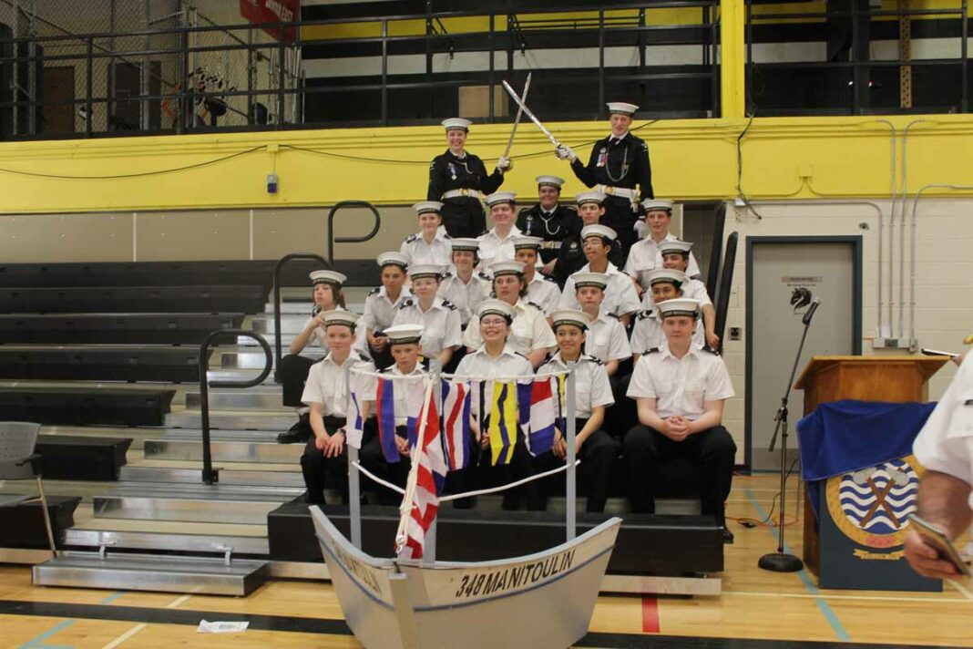 Members of the 348 Manitoulin Royal Canadian Sea Cadet Corps pose for a photograph after the 19th annual ceremonial review. photo by Michael Erskine.