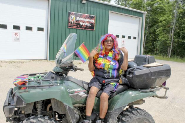 Gloria Debassige and her ATV are all decked out for the Sheshegwaning Pride parade.