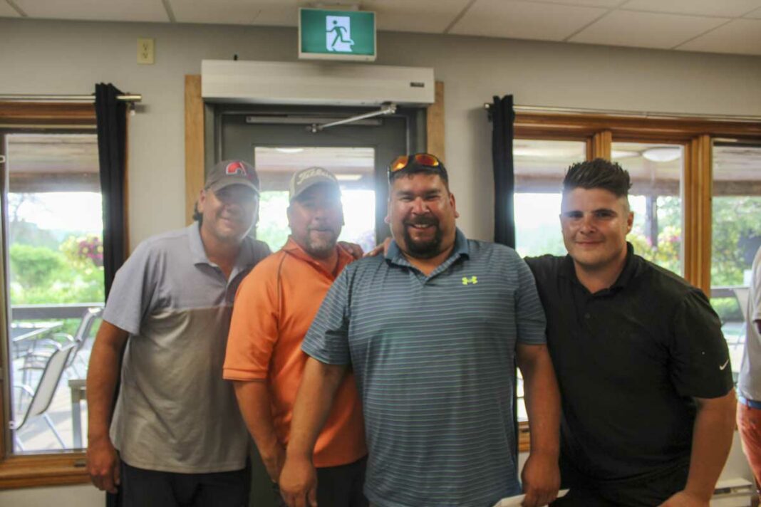 The team made up of Shawn Assinewai, Garrett McCumber, Stan and Trevor Esquimaux (shown in photo) finished in first place at the annual four-person string tournament held at Manitoulin Golf this past Saturday. photo by Shelley Croft