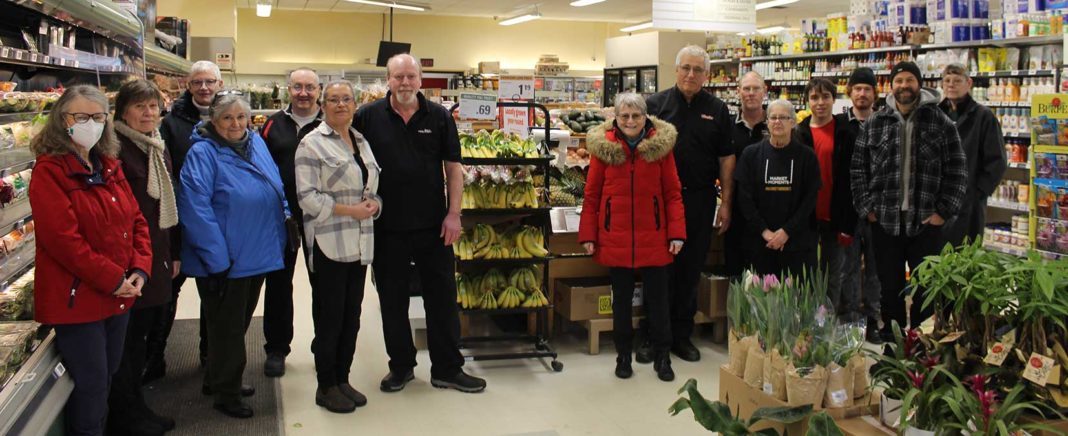 group of people in a grocery store