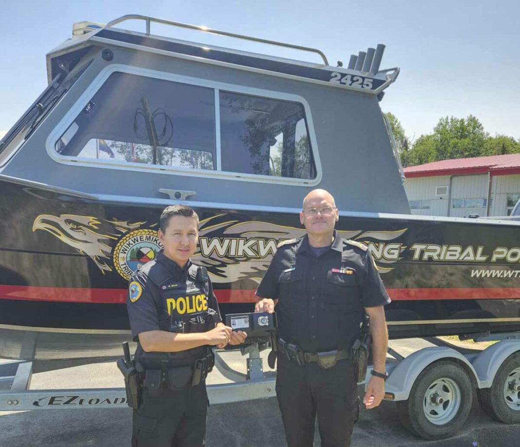 The Wikwemikong Tribal Police Service welcomed a new constable to its ranks last week. Constable Martin Necan, left, is welcomed to the detachment by Jason Spooner, acting chief of police.