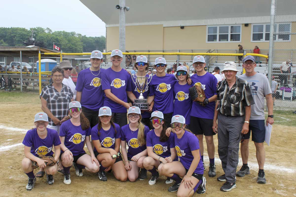 The Clear Lakers won the King division (age 15-16)  A division final over Pitch Perfect. Doug and Cathy King, on behalf of the King family are standing in photo along with members of the winning team which included Ethan Leblanc, Regan Houle, Anderson Parker, Ashton Clement, Ryder Coe, Ethan Hodder, Andi Sokoloski, Payton Sokoloski, Cierra Sokoloski, Kailyn McDougall, Rylee Patreau, Delayna Rantanen. The King B division final was won by the Warriors over Scared Hitless.